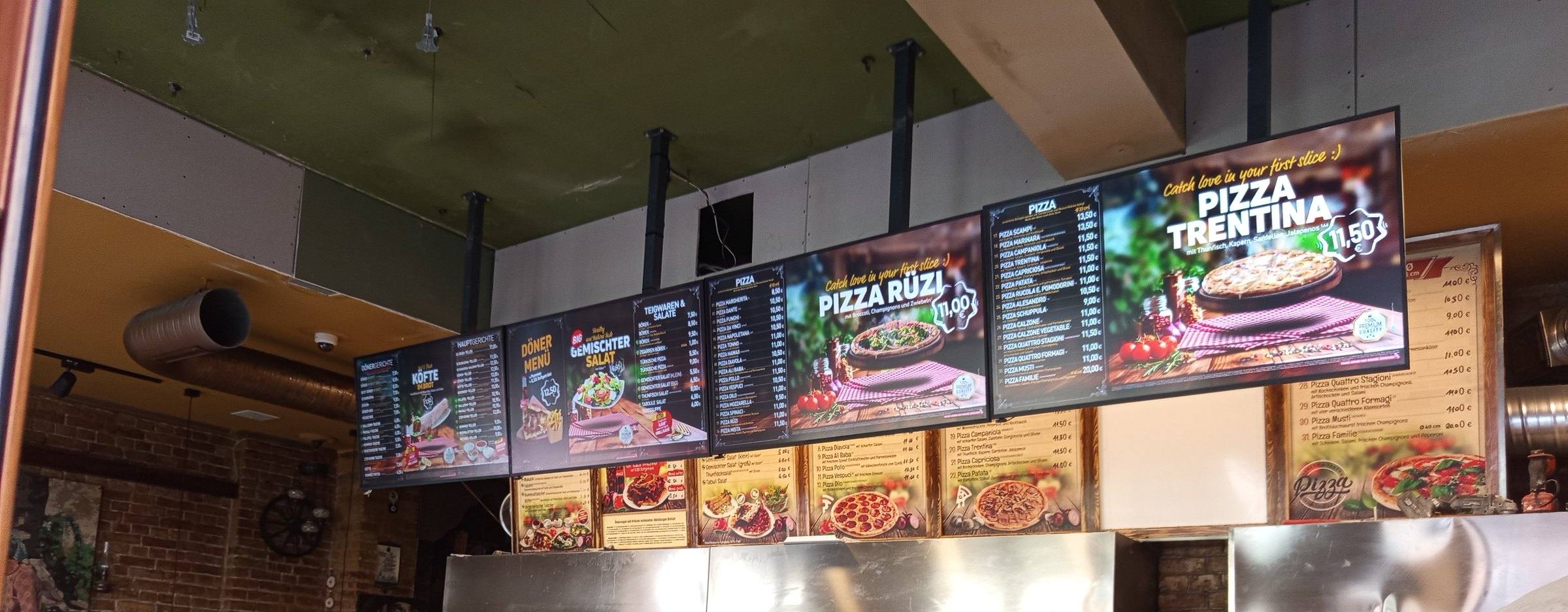 Reihe digitaler Menübildschirme mit Pizza- und Dönerangebot (WSCREEN)