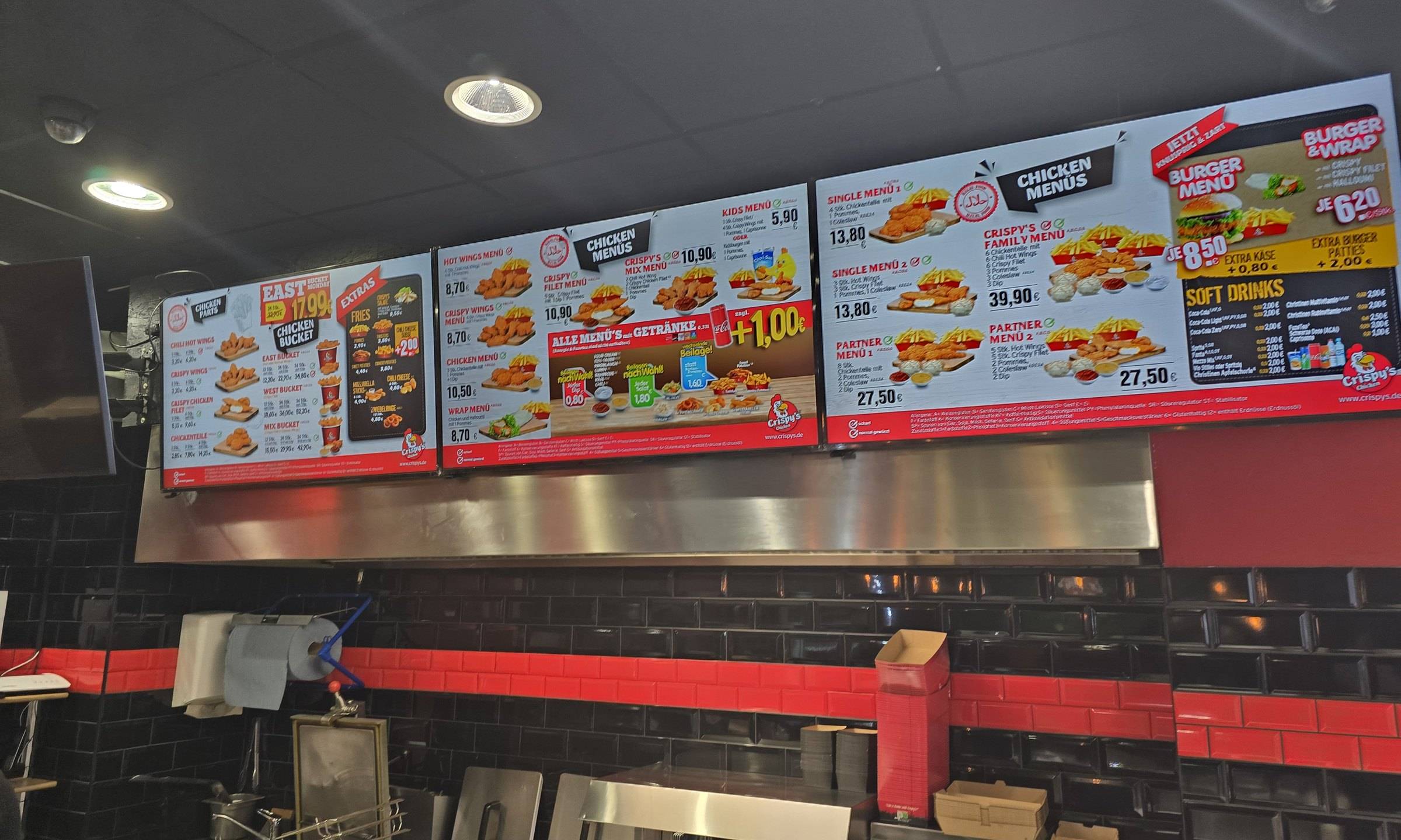 Digital menu boards above the counter at Crispy’s, controlled with WSCREEN